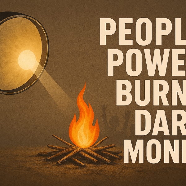 Magnifying glass focusing sunlight into a small flame on kindling, cracked concrete backdrop. • Accessibility Text: Hero image symbolizing collective ignition of citizen action against dark money.